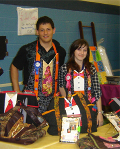 Kevin and Maria at QuiltMoxie booth at Salon 2010 Kevin and Maria at QuiltMoxie booth at Salon 2010