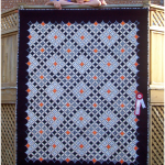 Ariana and Luis and their cathedral window quilt